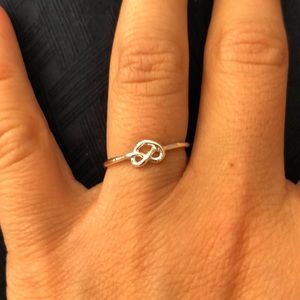 NWT Silver knot heart ring. Never worn.